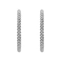 Signature Caviar Small Caviar Hoop Earrings featuring sterling silver caviar beading, showcasing a timeless and elegant design ideal for everyday wear or layering.