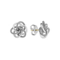 Bands of smooth sterling silver with signature Caviar beading form these classic knot stud earrings.