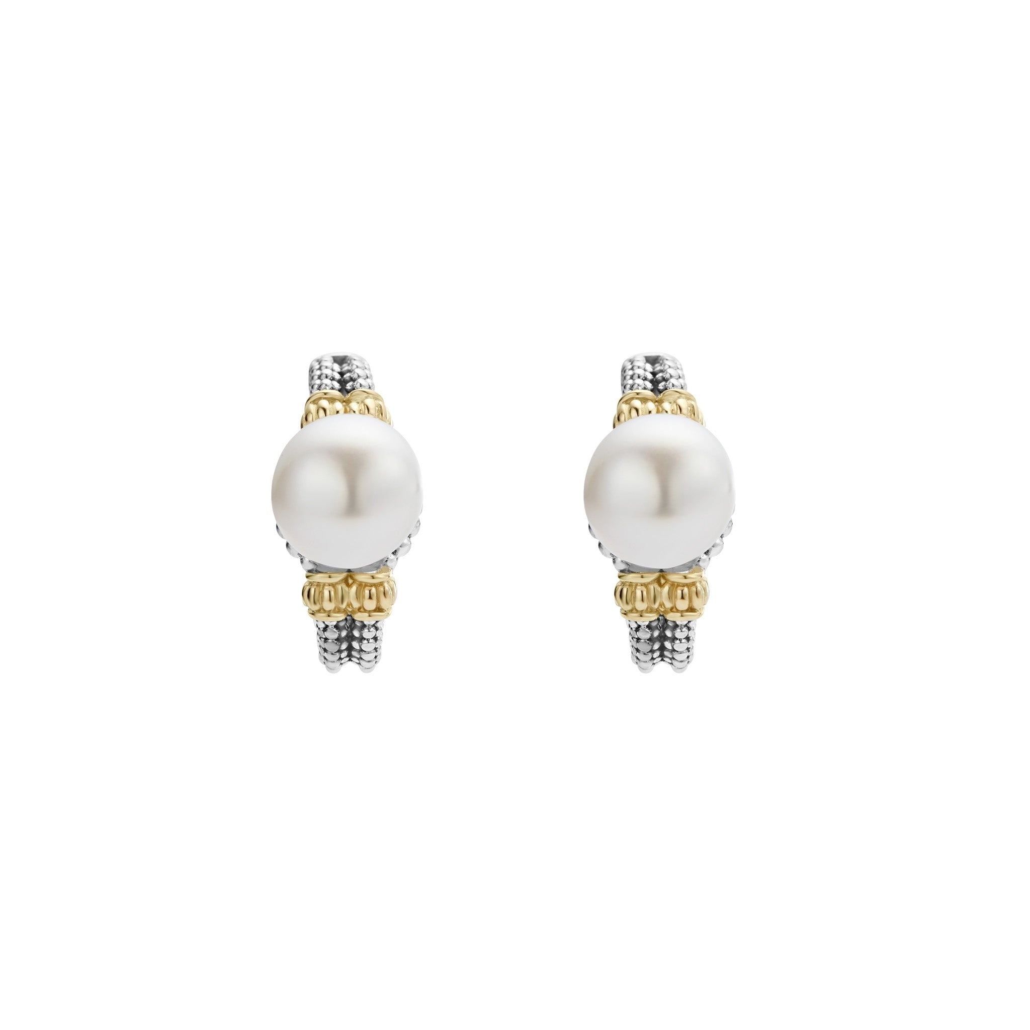 Luna Two-Tone Pearl Huggie Earrings feature a large white pearl on a sterling silver and 18K gold beaded band, embodying LAGOS's elegant craftsmanship.