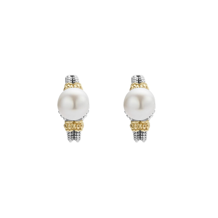 Luna Two-Tone Pearl Huggie Earrings feature a large white pearl on a sterling silver and 18K gold beaded band, embodying LAGOS's elegant craftsmanship.