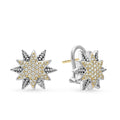 Diamonds, 18K gold, and sterling silver Caviar beading form these star motif earrings. LAGOS diamonds are the highest quality natural stones.
