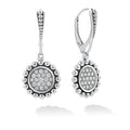 Pavé diamond circle drop earrings accented by sterling silver Caviar beading. LAGOS diamonds are the highest quality natural stones.