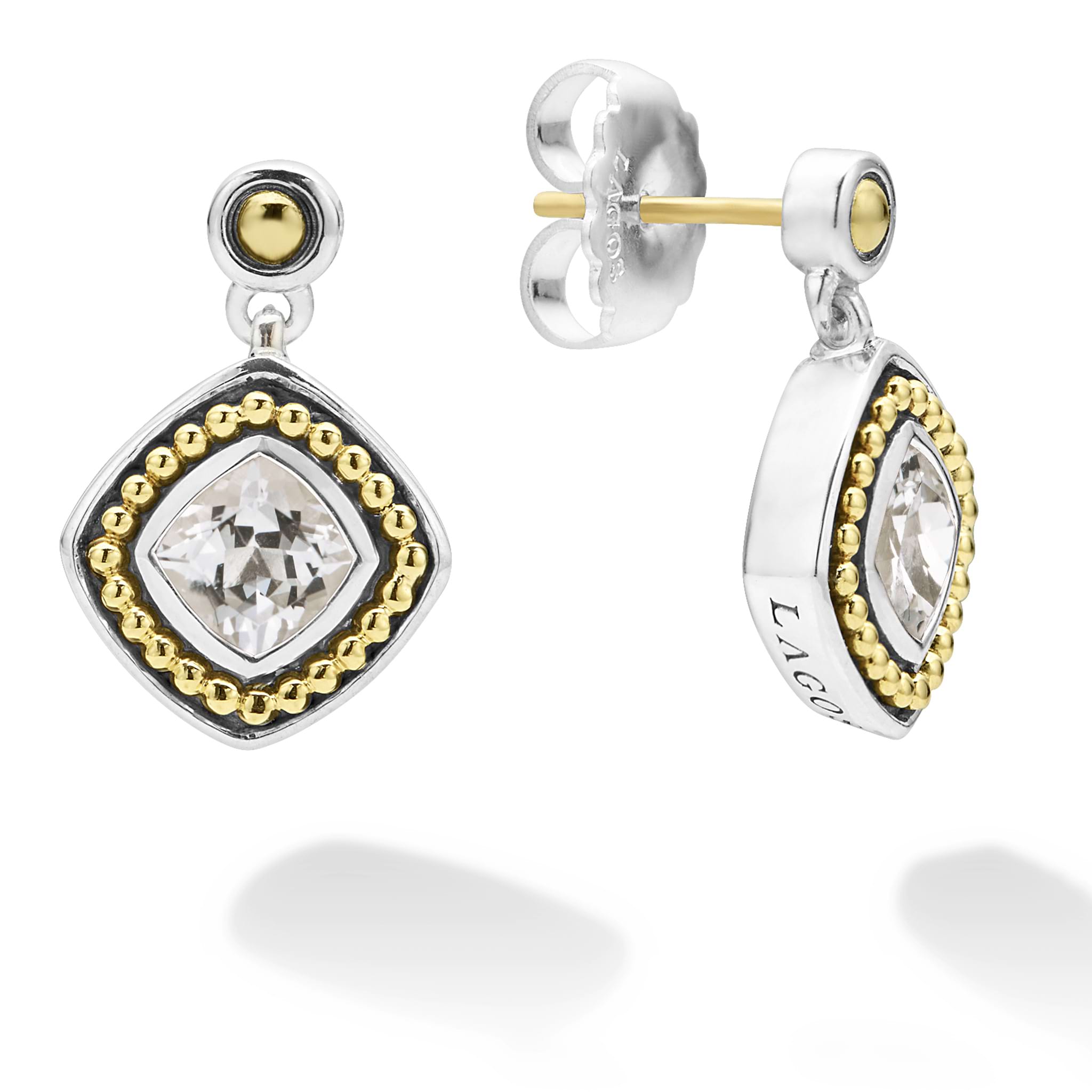 White topaz gemstone drop earrings surrounded by sterling silver and 18K gold Caviar beading.