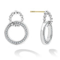 A diamond circle interlocks with a caviar beaded circle to form each earring of this set. LAGOS diamonds are the highest quality natural stones.