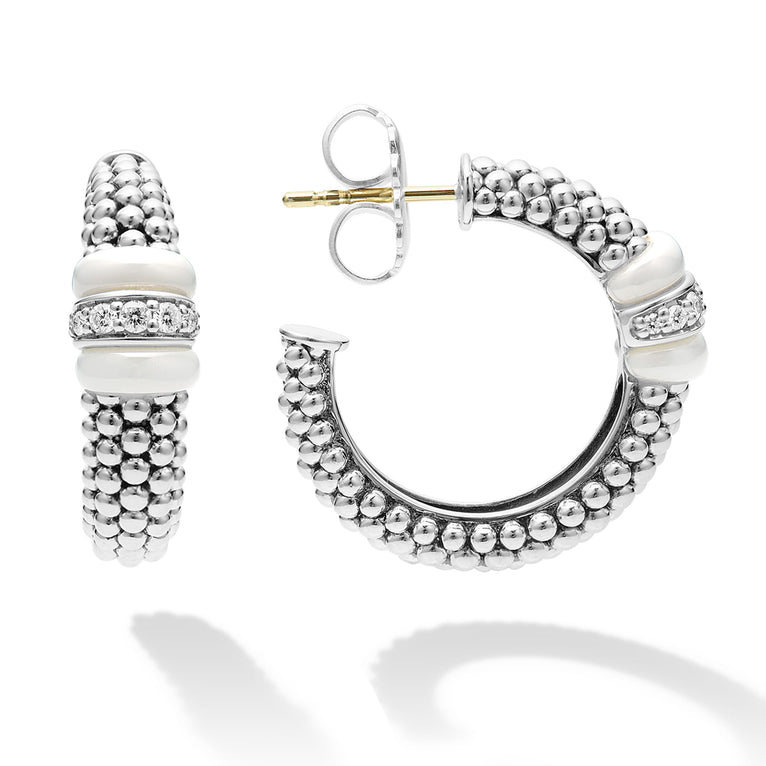 White ceramic and a diamond station highlight these sterling silver Caviar beaded hoop earrings. LAGOS diamonds are the highest quality natural stones.