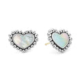 Mother of pearl gemstone earrings framed by Caviar beading in the shape of a heart.