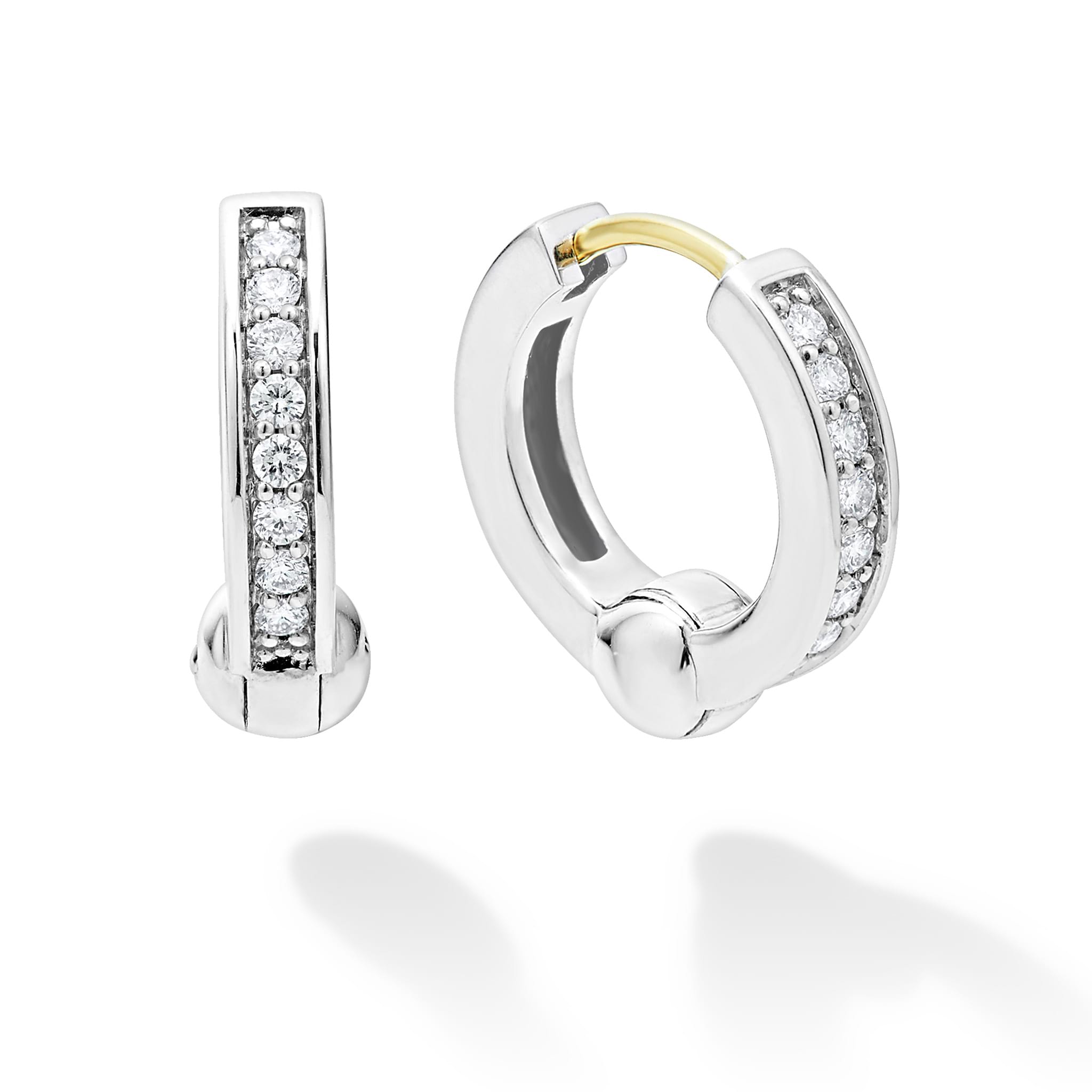 Diamonds set in a smooth sterling silver circle motif form this timeless huggie earring. LAGOS diamonds are the highest quality natural stones.
