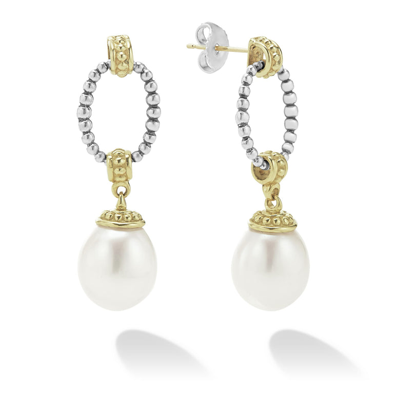 Sterling silver and 18k gold Caviar beaded post earrings with pearl drop detailing.