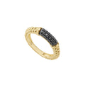 Pavé black diamonds set in 18k gold with Caviar beaded accents on this classic band ring.