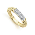 Pavé diamonds set in 18K gold with Caviar beaded accents on this classic band ring. LAGOS diamonds are the highest quality natural stones.