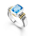 Swiss blue topaz bezel-set gemstone ring with 18K Caviar beading on a sterling silver band.
