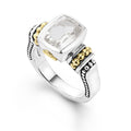 White topaz bezel-set gemstone ring with 18K Caviar beading on a sterling silver band.