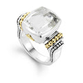 White topaz bezel-set gemstone ring with 18K gold Caviar beading on a sterling silver band.