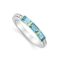 Three swiss blue topaz gemstones form this stacking ring surrounded by sterling silver Caviar beading.