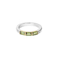 Rittenhouse Green Tourmaline Stacking Ring with three baguette-cut tourmaline stones in gold settings on a sterling silver band, designed for stacking elegance.