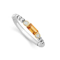 Citrine gemstone with diamonds form this stacking ring surrounded by 18K gold and sterling silver Caviar beading. LAGOS diamonds are the highest quality natural stones.