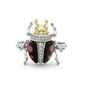 Rare Wonders Onyx Beetle Diamond Ring featuring black onyx, 18K gold head, diamond-set thorax, and sterling silver legs, showcasing LAGOS' signature elegance and craftsmanship.