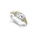 White topaz gemstone ring surrounded by sterling silver and 18k gold Caviar beading.