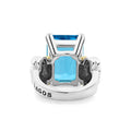 Glacier Large Emerald-Cut Swiss Blue Topaz Ring in sterling silver with 18K gold caviar beading, featuring a radiant blue topaz in a prong setting, engraved LAGOS.
