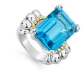 The return of a LAGOS icon. Our signature emerald-cut swiss blue topaz gemstone ring with a prong setting in sterling silver and 18K gold Caviar beading.