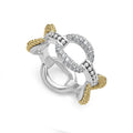 18k gold and sterling silver variations of Caviar beading & fluting elements accented by diamonds form this oval link ring. LAGOS diamonds are the highest quality natural stones.