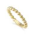 A wonderful stacking ring with Caviar beading in 18K gold.