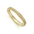 A classic 18K gold Caviar beaded stacking ring.