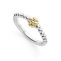 Wonderful to layer. A perfectly detailed 18K gold and sterling silver ring with Caviar beading.