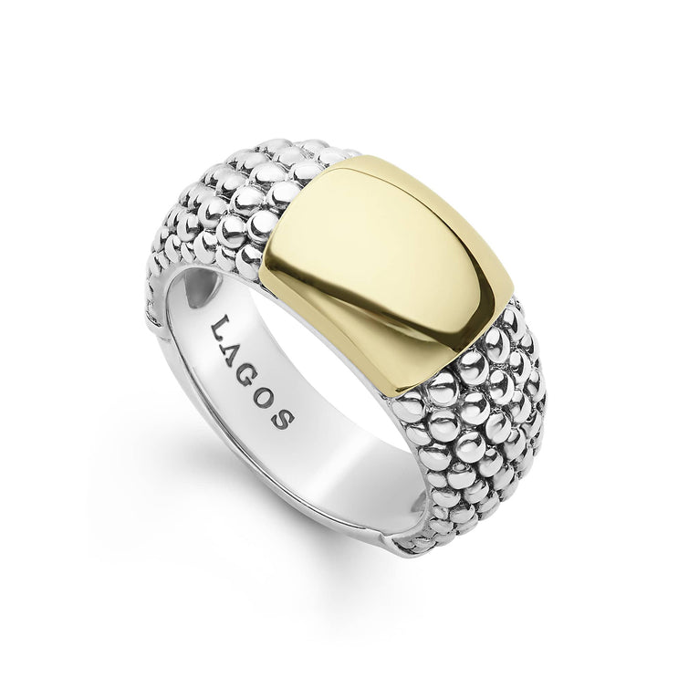 A smooth station of 18K gold set by sterling silver Caviar beading.