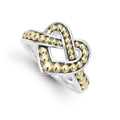 Sterling silver and 18k gold form this unique Beloved heart ring.
