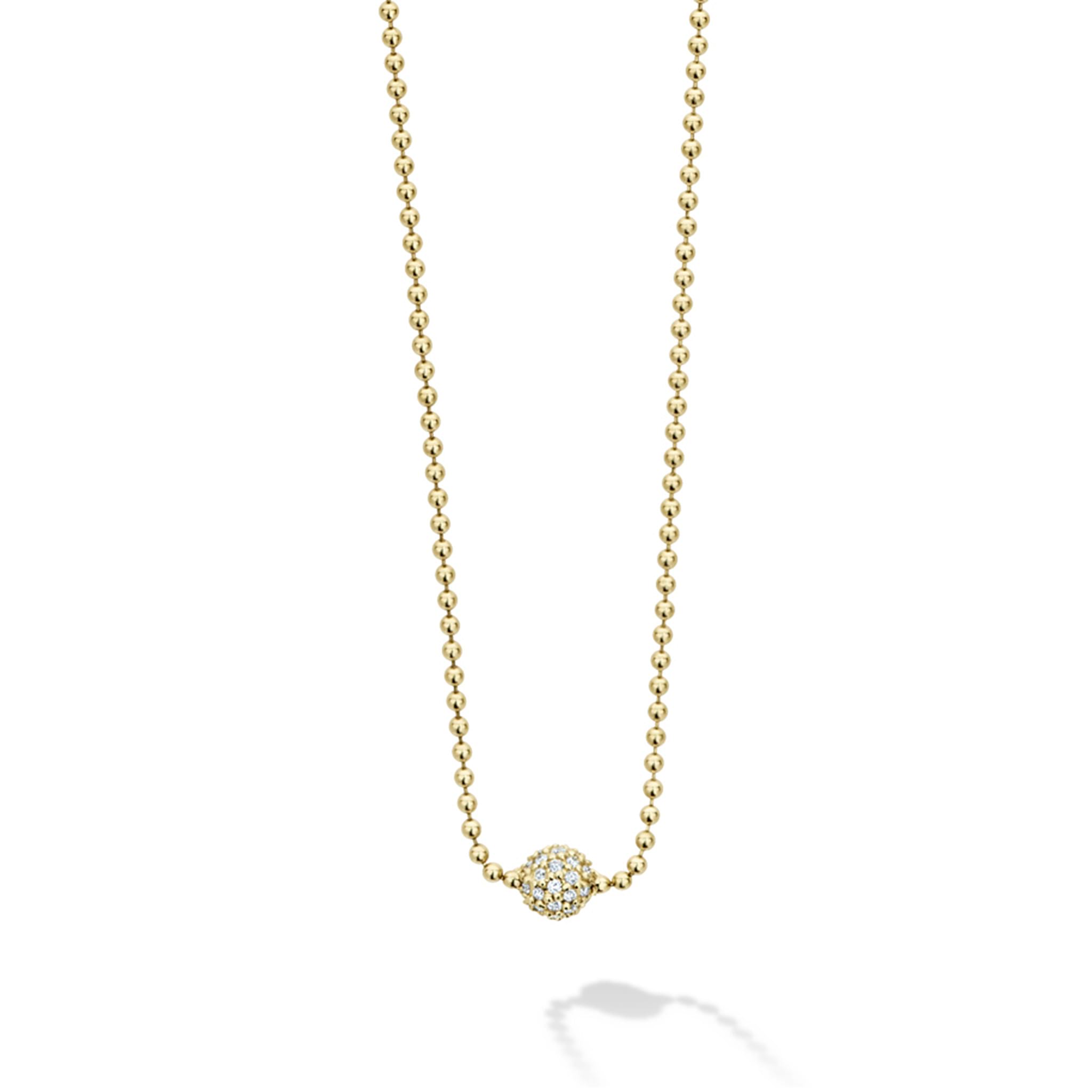 A pavé diamond bead station finished on an 18K gold beaded strand with an 18K gold signature lobster clasp. LAGOS diamonds are the highest quality natural stones.