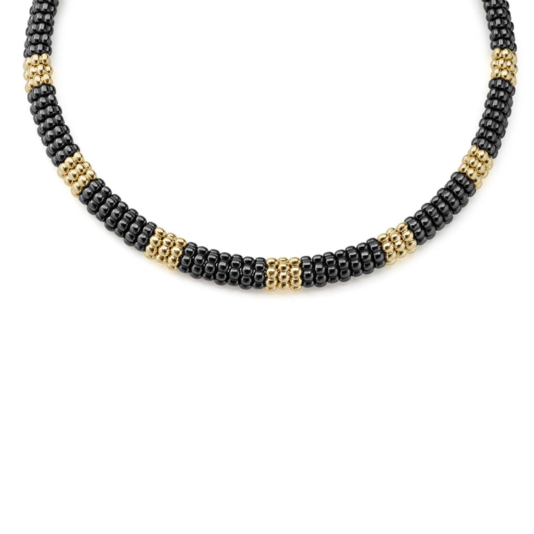 Eleven 18K gold stations highlighted by black ceramic Caviar beading form this necklace.