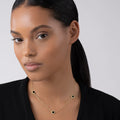 Model Wearing Three Station Round Onyx Necklace