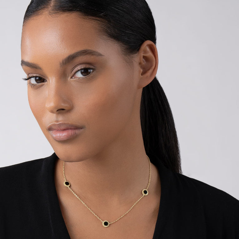 Model Wearing Three Station Round Onyx Necklace