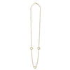 Three round Mother of Pearl stations set and surrounded by 18K gold Caviar beading on this necklace.