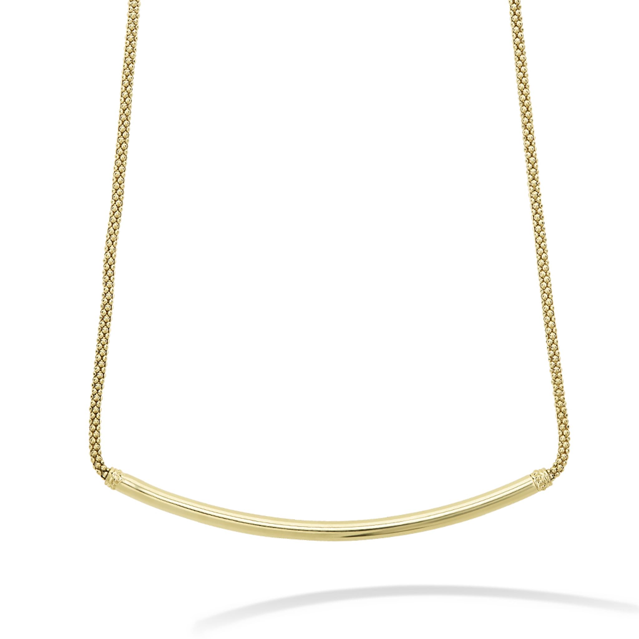 A signature 18k gold Caviar beaded necklace with a smooth gold bar.