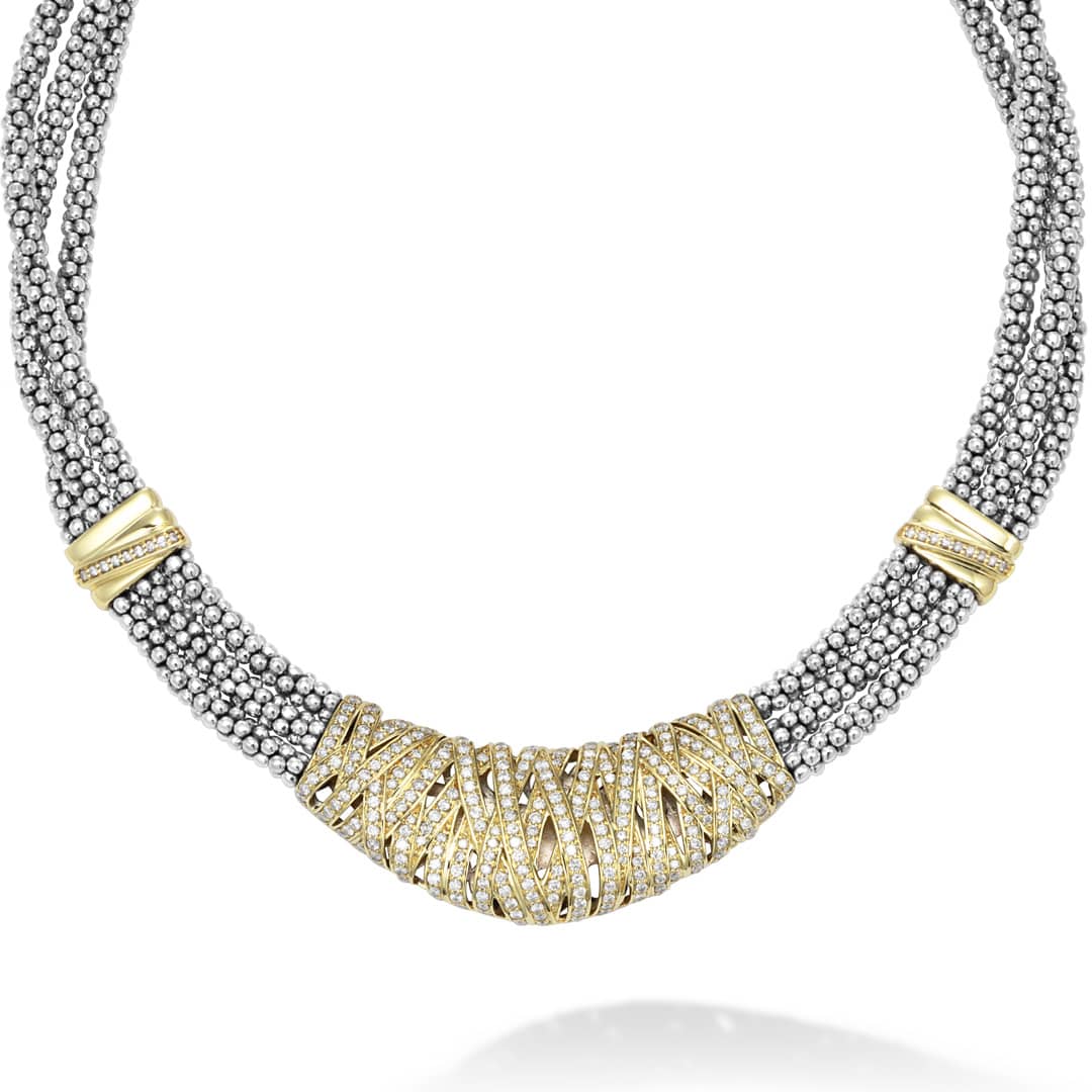 Pavé diamonds in 18K gold wrap around this statement necklace with three strands of sterling silver beading. LAGOS diamonds are the highest quality natural stones.