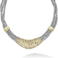 Pavé diamonds in 18K gold wrap around this statement necklace with three strands of sterling silver beading. LAGOS diamonds are the highest quality natural stones.