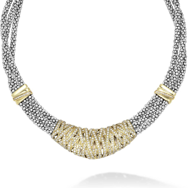 Pavé diamonds in 18K gold wrap around this statement necklace with three strands of sterling silver beading. LAGOS diamonds are the highest quality natural stones.