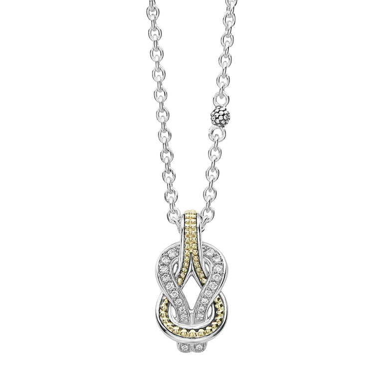 Diamond and 18K gold knot pendant finished on a versatile link necklace with six sterling silver Caviar beaded stations. LAGOS diamonds are the highest quality natural stones.