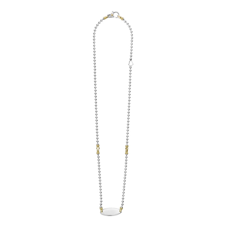 Beloved Oval Plate Necklace featuring a sterling silver ball-chain design, accented with 18K gold caviar beading and a polished ID-tag pendant.