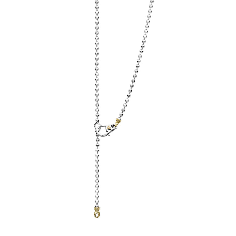 Beloved Oval Plate Necklace: A two-stranded ball-chain in sterling silver with 18K gold caviar beading, featuring a mixed-metal clasp and gold accent ring.