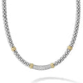 A diamond station accented by 18K gold Caviar beading forms this sterling silver Caviar beaded necklace. LAGOS diamonds are the highest quality natural stones.