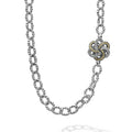 Sterling silver Caviar bead links form this versatile necklace with four 18K Gold and Sterling Silver Love Knot stations.