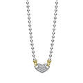 Diamonds and sterling silver form this heart pendant with 18K gold beading on an adjustable ball chain necklace. LAGOS diamonds are the highest quality natural stones.