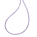 Amethyst gemstone beaded necklace with Caviar beading and fluted accents. Gemstones are natural with unique hues. Variations from the colors shown make each necklace unique.