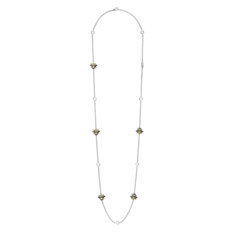 Rare Wonders Five Station Honeybee Necklace with fine-link silver, hexagon accents, and bee charms, showcasing LAGOS craftsmanship with 18K gold Caviar beading and black rhodium.