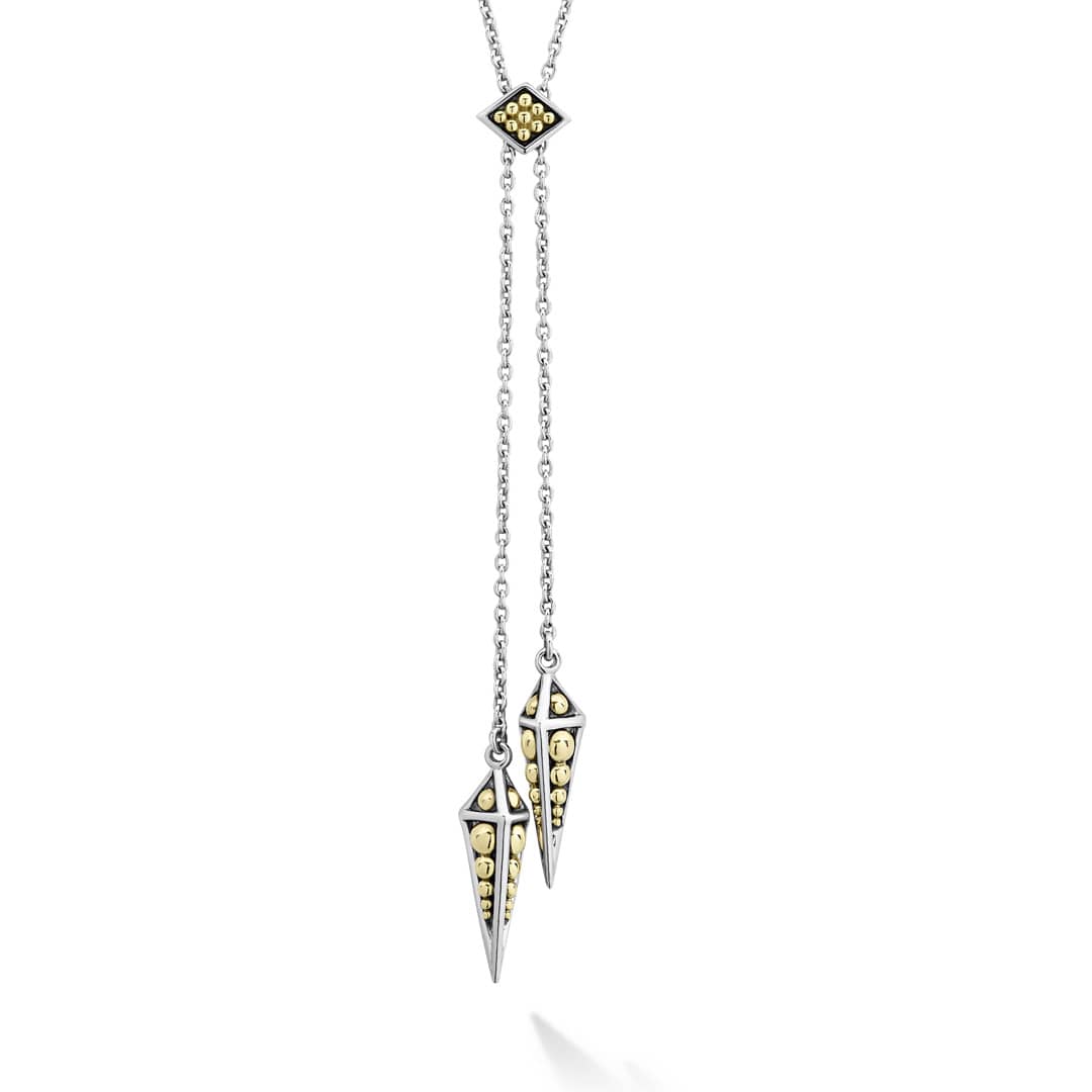 Pyramids of 18K gold and sterling silver form this versatile lariat necklace.