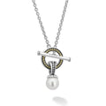 A cultured freshwater pearl is the highlight of this sterling silver and 18k gold Caviar bead toggle pendant necklace.