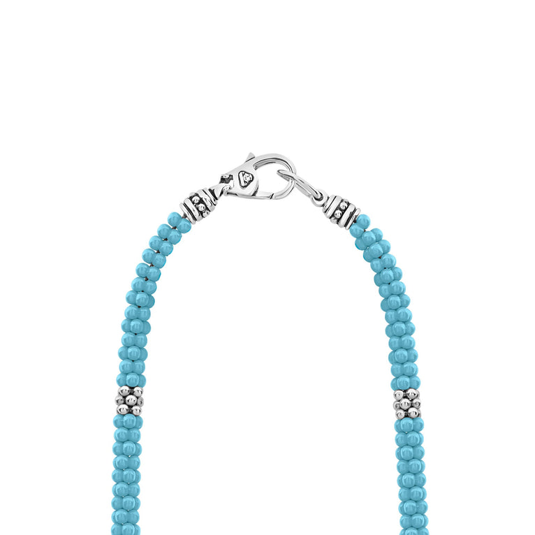 Blue Caviar Silver Station Ceramic Beaded Necklace 5mm features turquoise-blue ceramic beads with sterling silver spacers and a lobster-claw clasp, showcasing LAGOS craftsmanship.